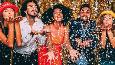 group celebrating with confetti